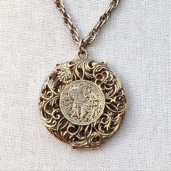 Vintage Jewelry - Vintage Venus and Cupid Locket necklace